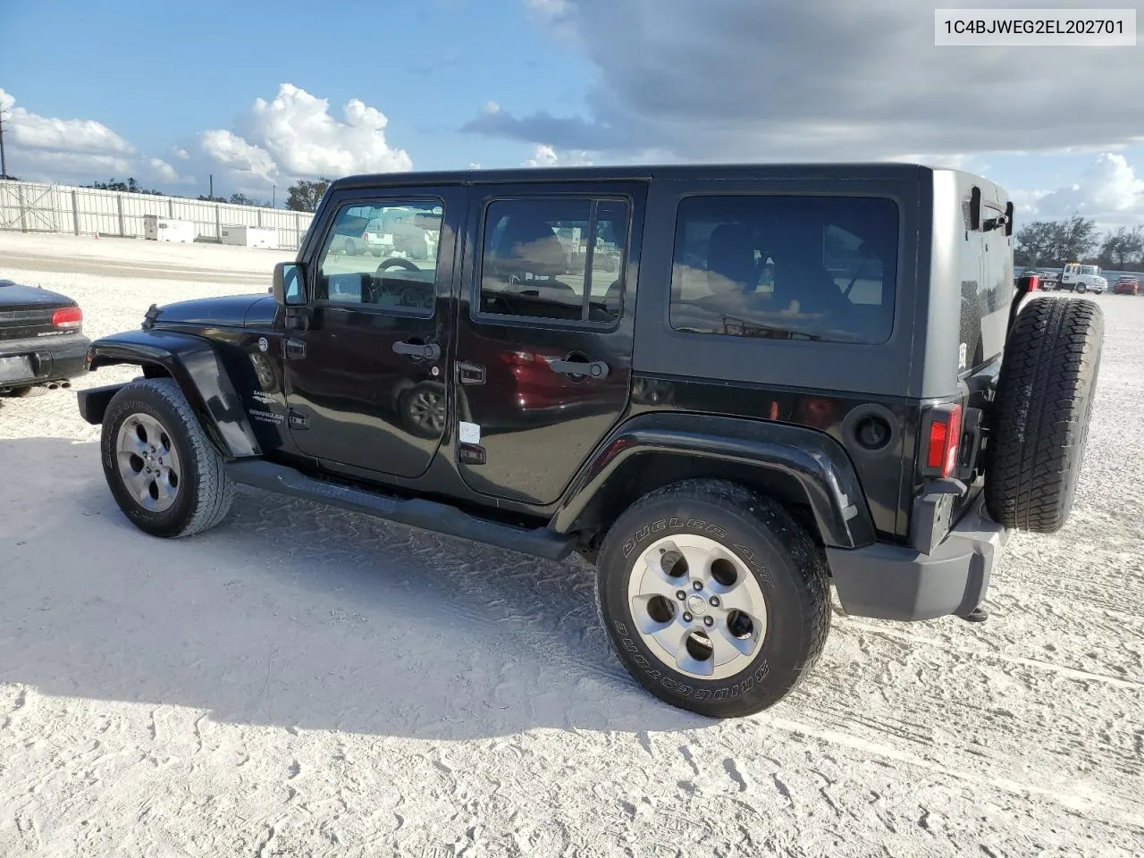 2014 Jeep Wrangler Unlimited Sahara VIN: 1C4BJWEG2EL202701 Lot: 75243104