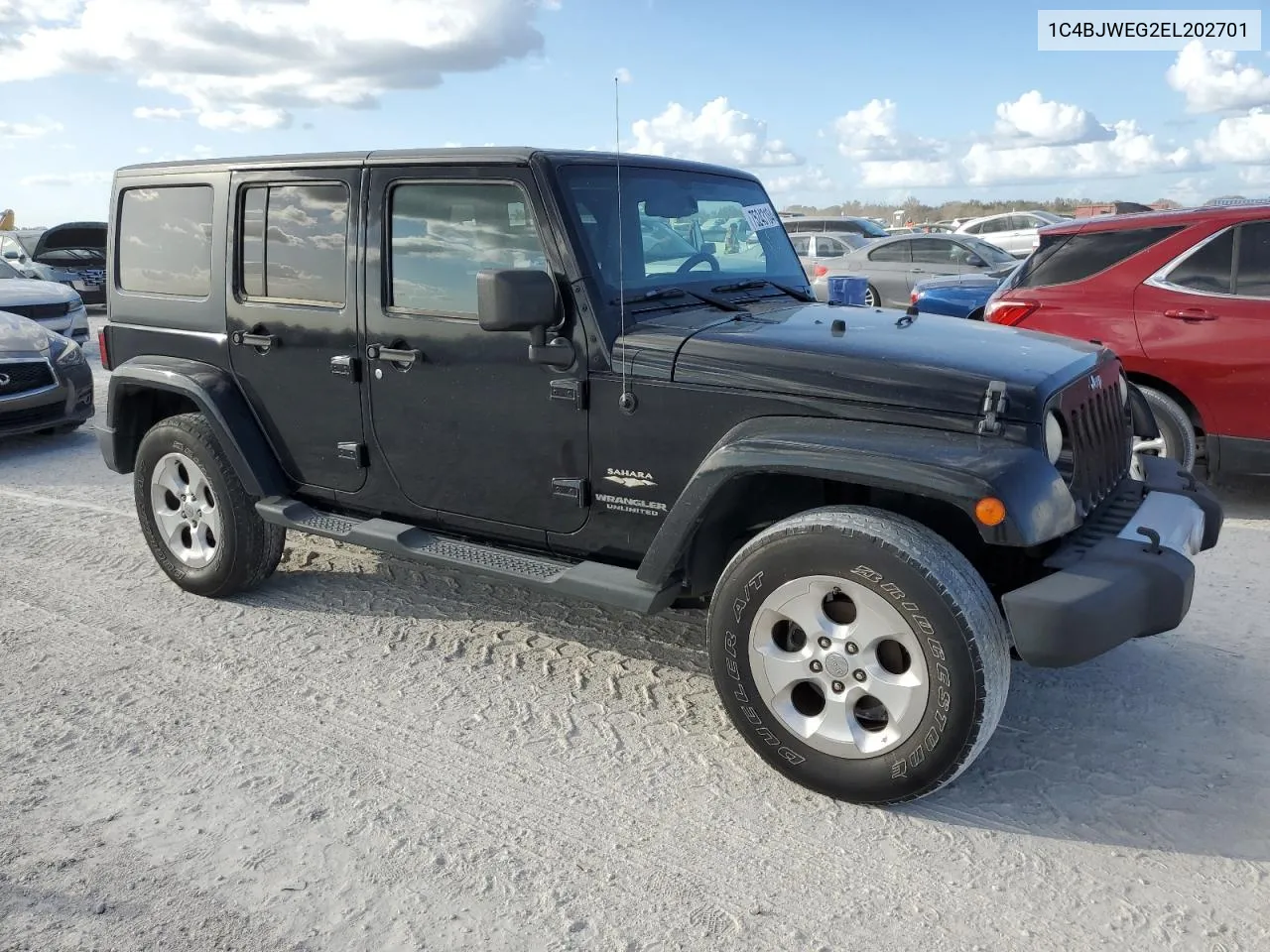 2014 Jeep Wrangler Unlimited Sahara VIN: 1C4BJWEG2EL202701 Lot: 75243104