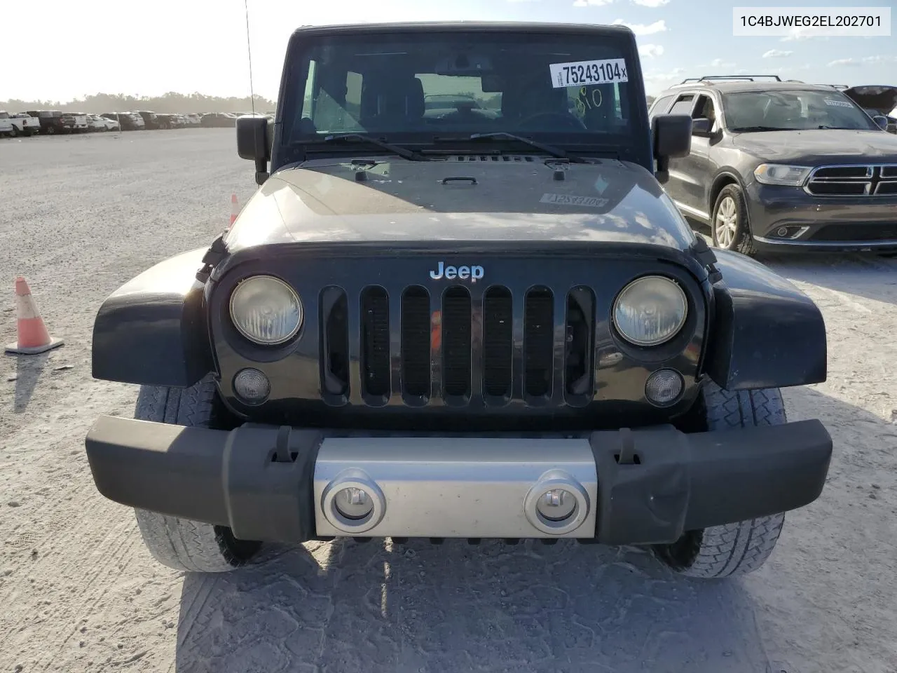 2014 Jeep Wrangler Unlimited Sahara VIN: 1C4BJWEG2EL202701 Lot: 75243104