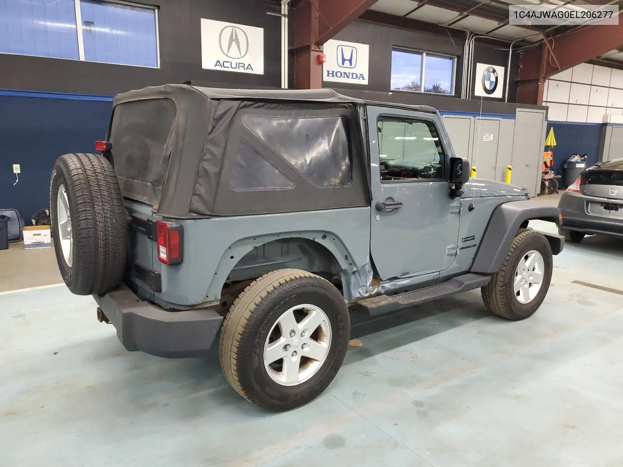 2014 Jeep Wrangler Sport VIN: 1C4AJWAG0EL206277 Lot: 75613584