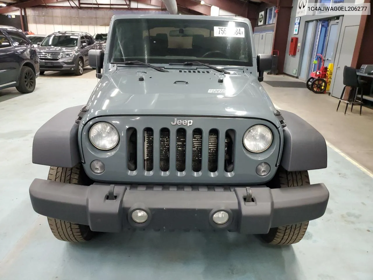 2014 Jeep Wrangler Sport VIN: 1C4AJWAG0EL206277 Lot: 75613584