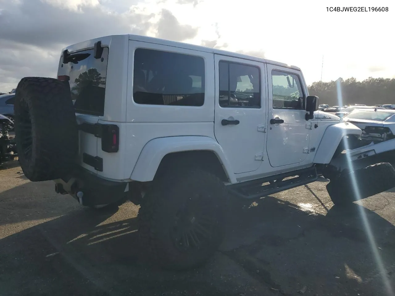 2014 Jeep Wrangler Unlimited Sahara VIN: 1C4BJWEG2EL196608 Lot: 78406564