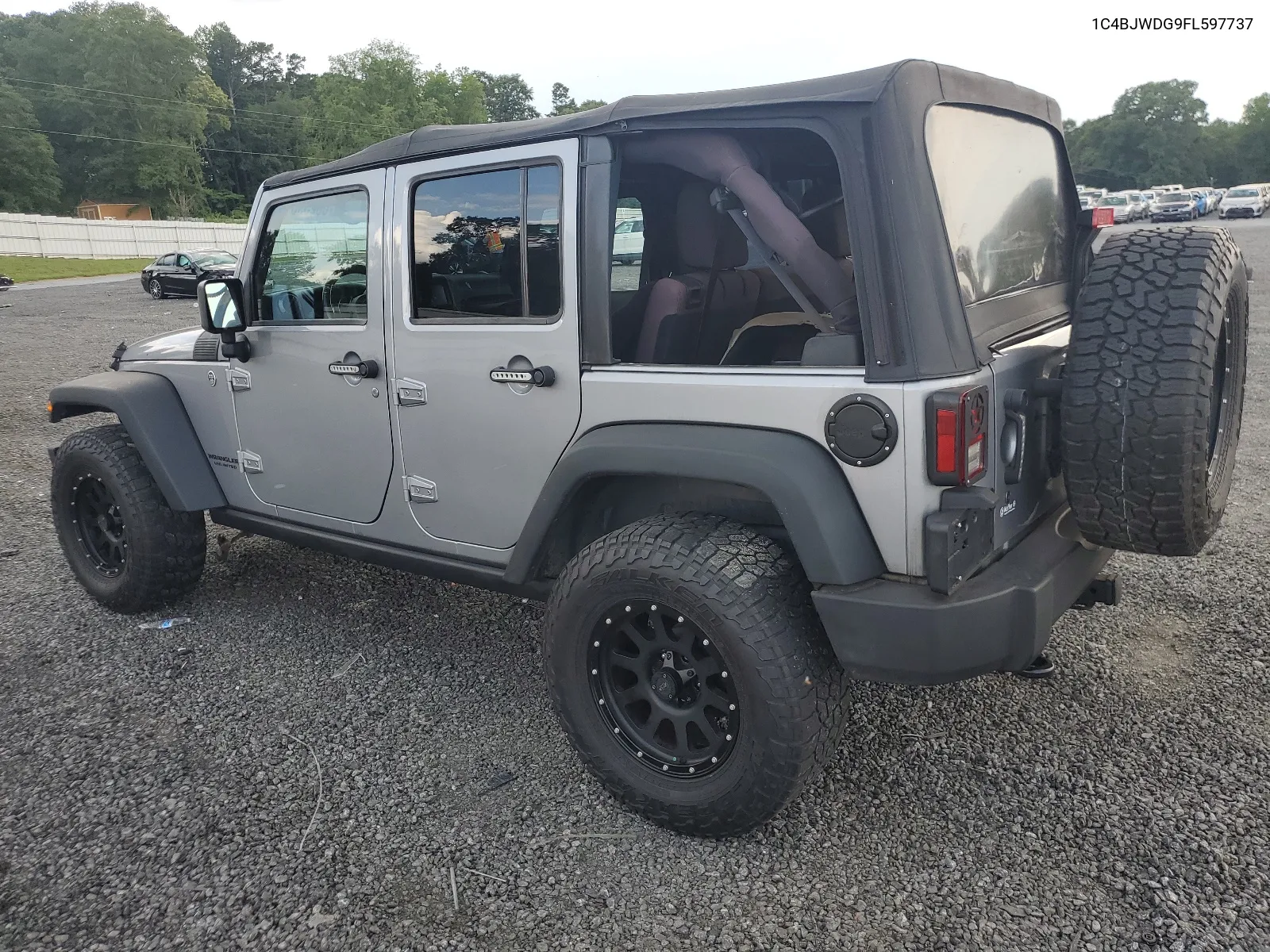 2015 Jeep Wrangler Unlimited Sport VIN: 1C4BJWDG9FL597737 Lot: 63239614