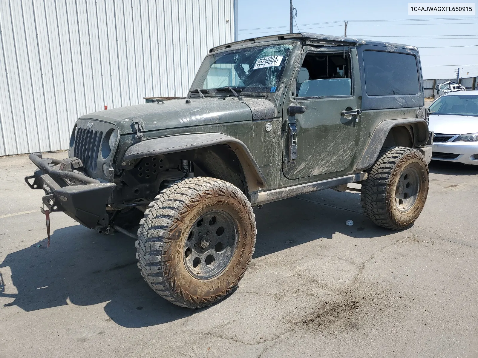 2015 Jeep Wrangler Sport VIN: 1C4AJWAGXFL650915 Lot: 65294004