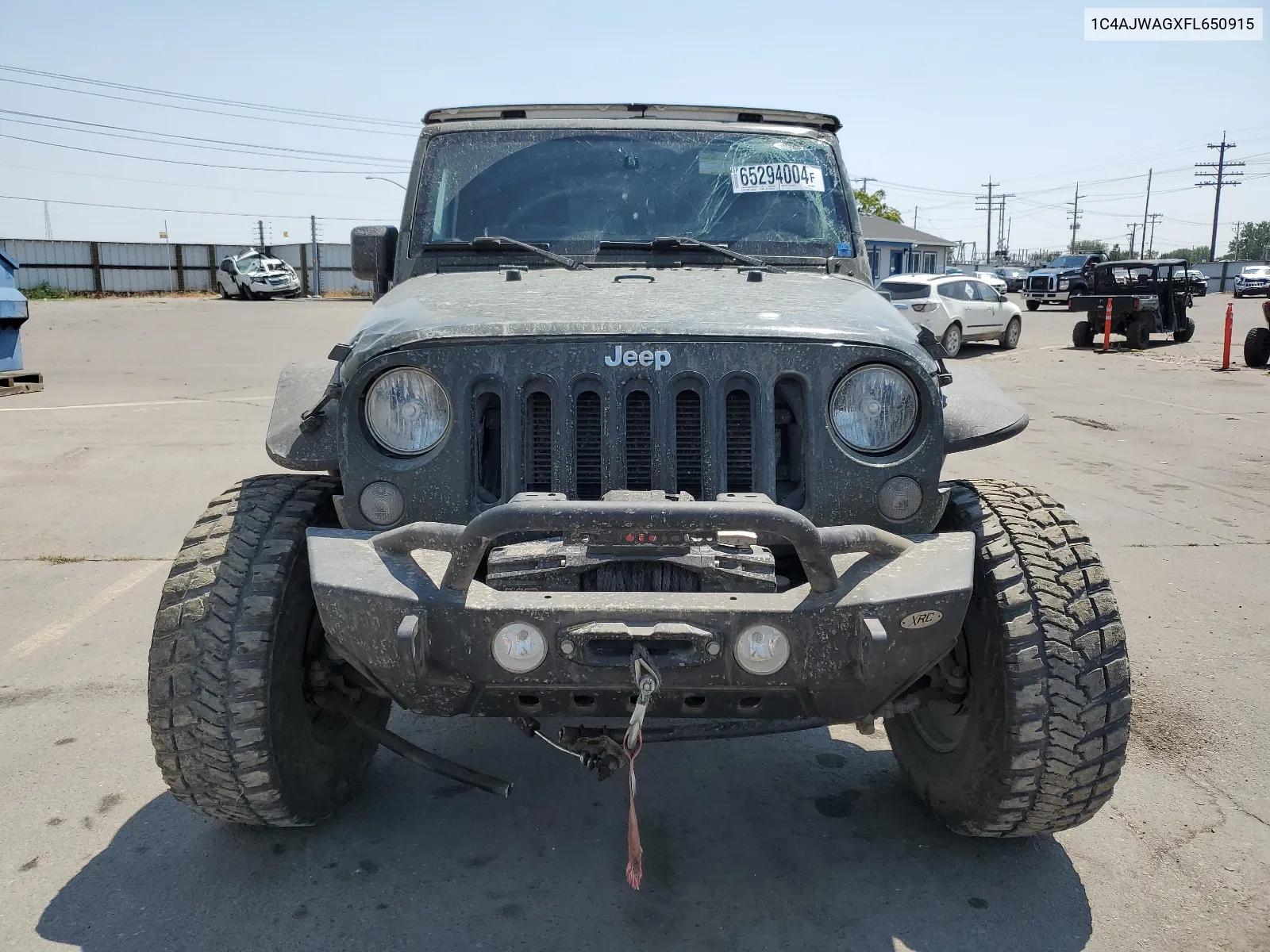 2015 Jeep Wrangler Sport VIN: 1C4AJWAGXFL650915 Lot: 65294004