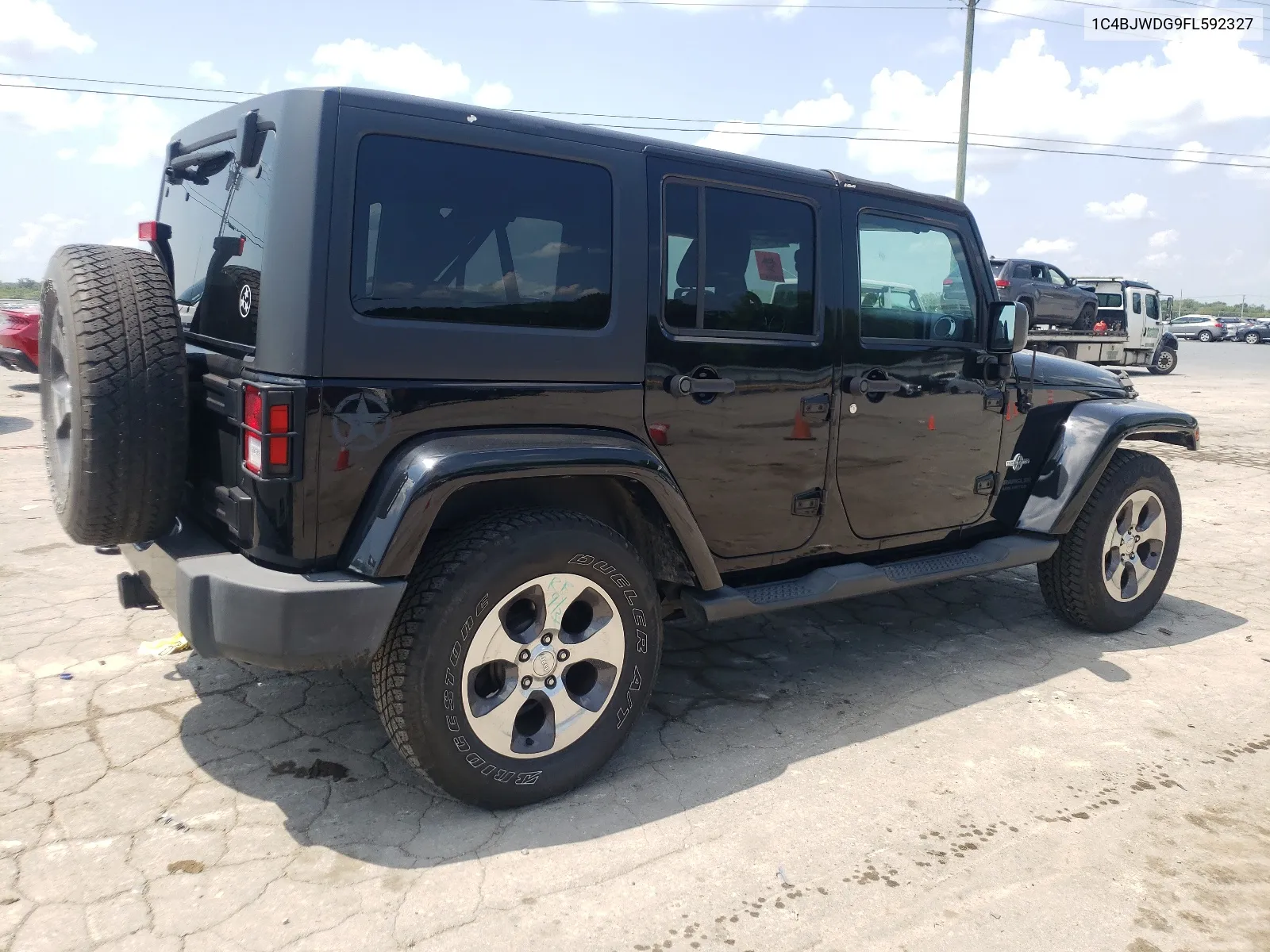 2015 Jeep Wrangler Unlimited Sport VIN: 1C4BJWDG9FL592327 Lot: 65959794