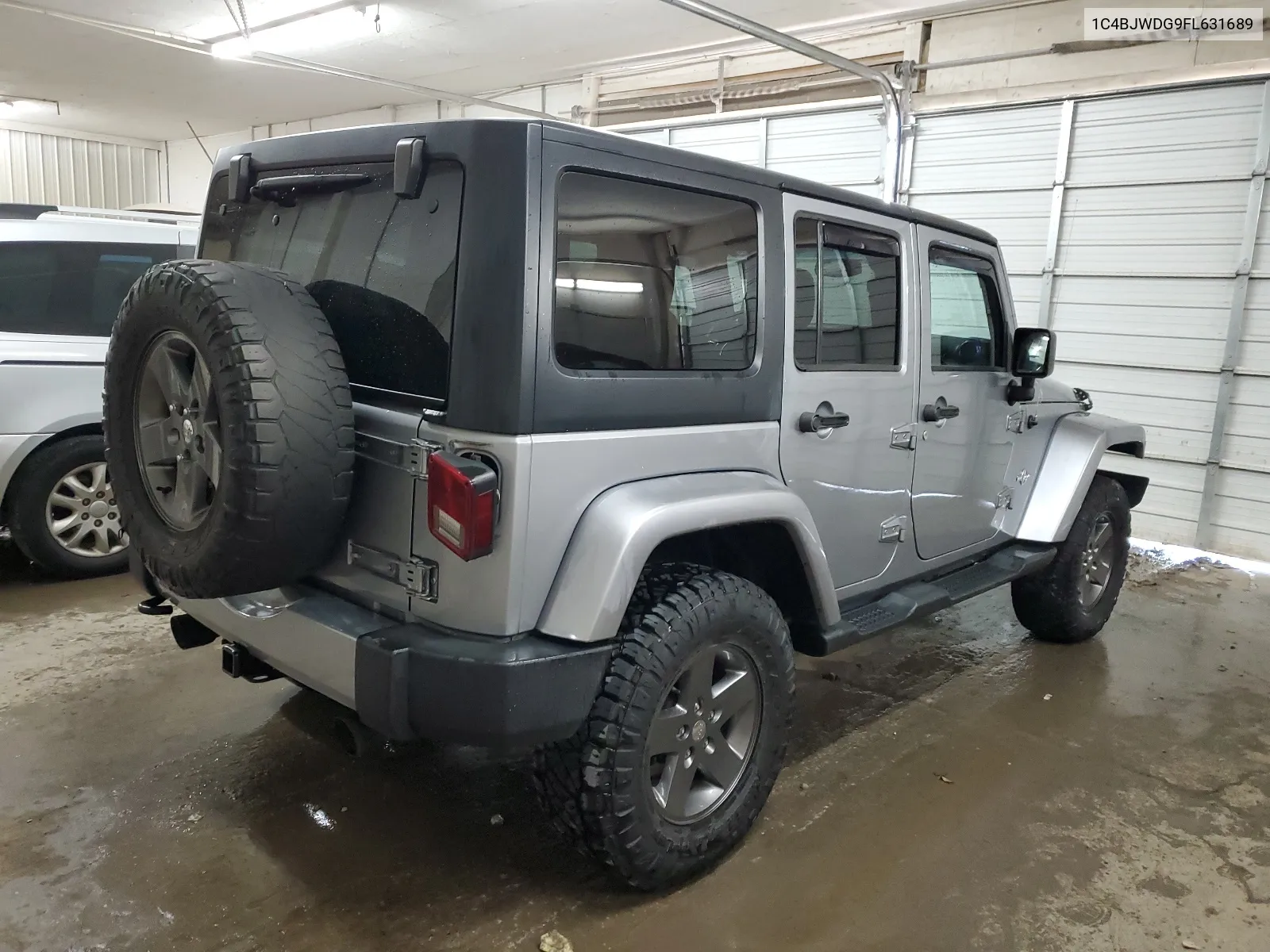 1C4BJWDG9FL631689 2015 Jeep Wrangler Unlimited Sport