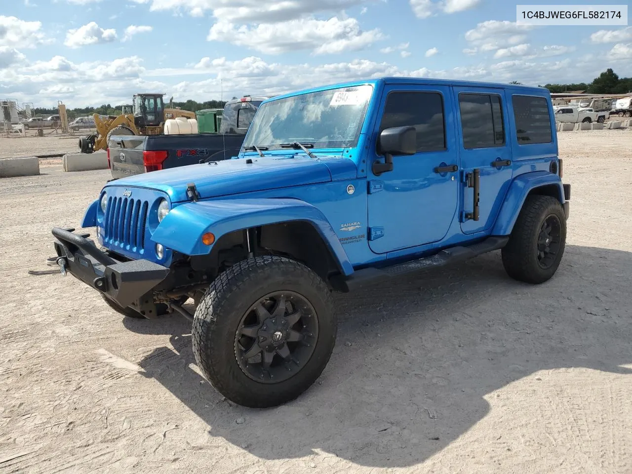 1C4BJWEG6FL582174 2015 Jeep Wrangler Unlimited Sahara