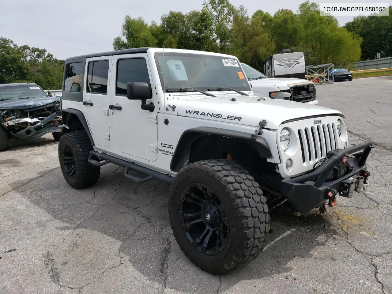 1C4BJWDG2FL658555 2015 Jeep Wrangler Unlimited Sport