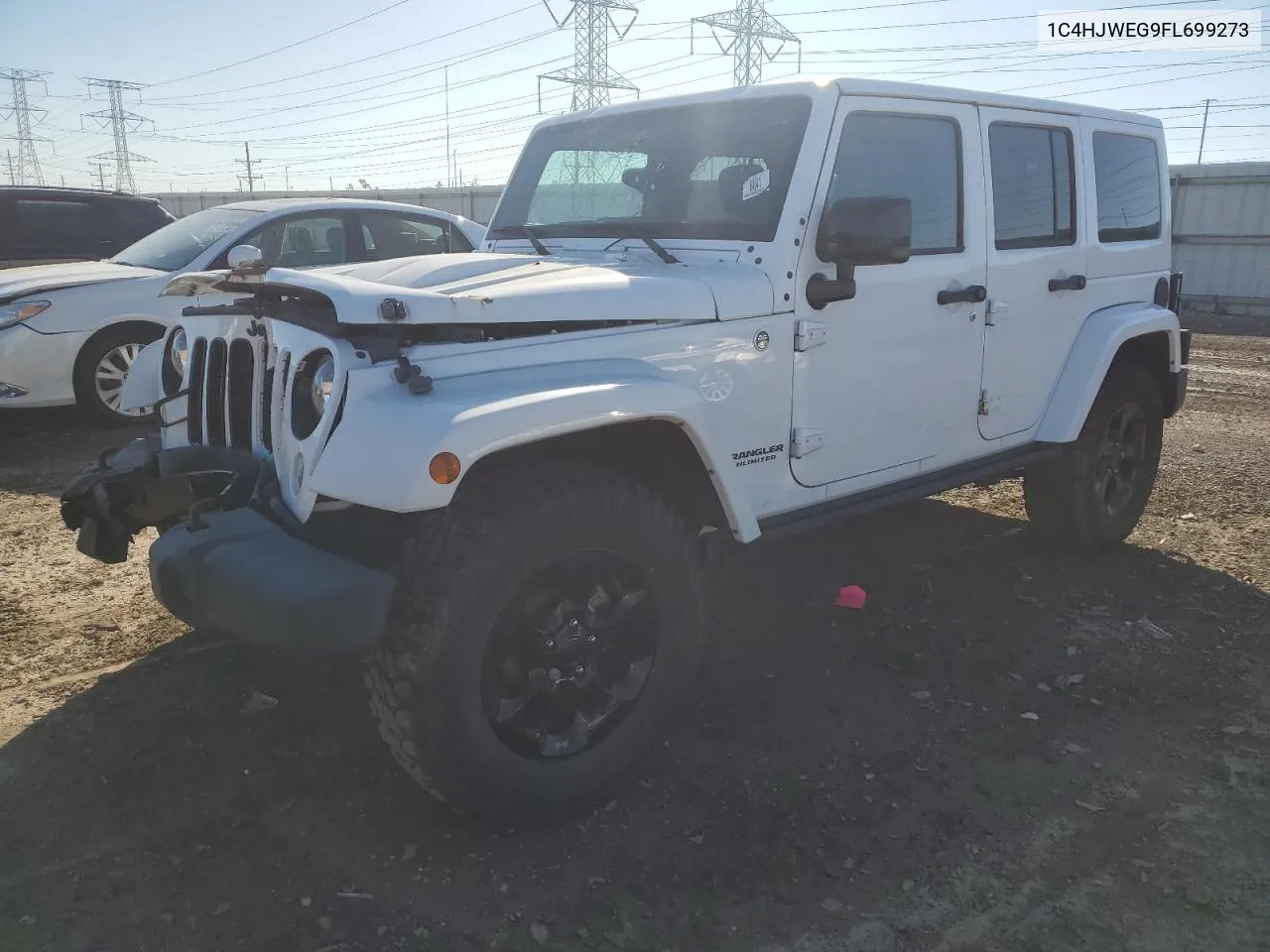 2015 Jeep Wrangler Unlimited Sahara VIN: 1C4HJWEG9FL699273 Lot: 73211374