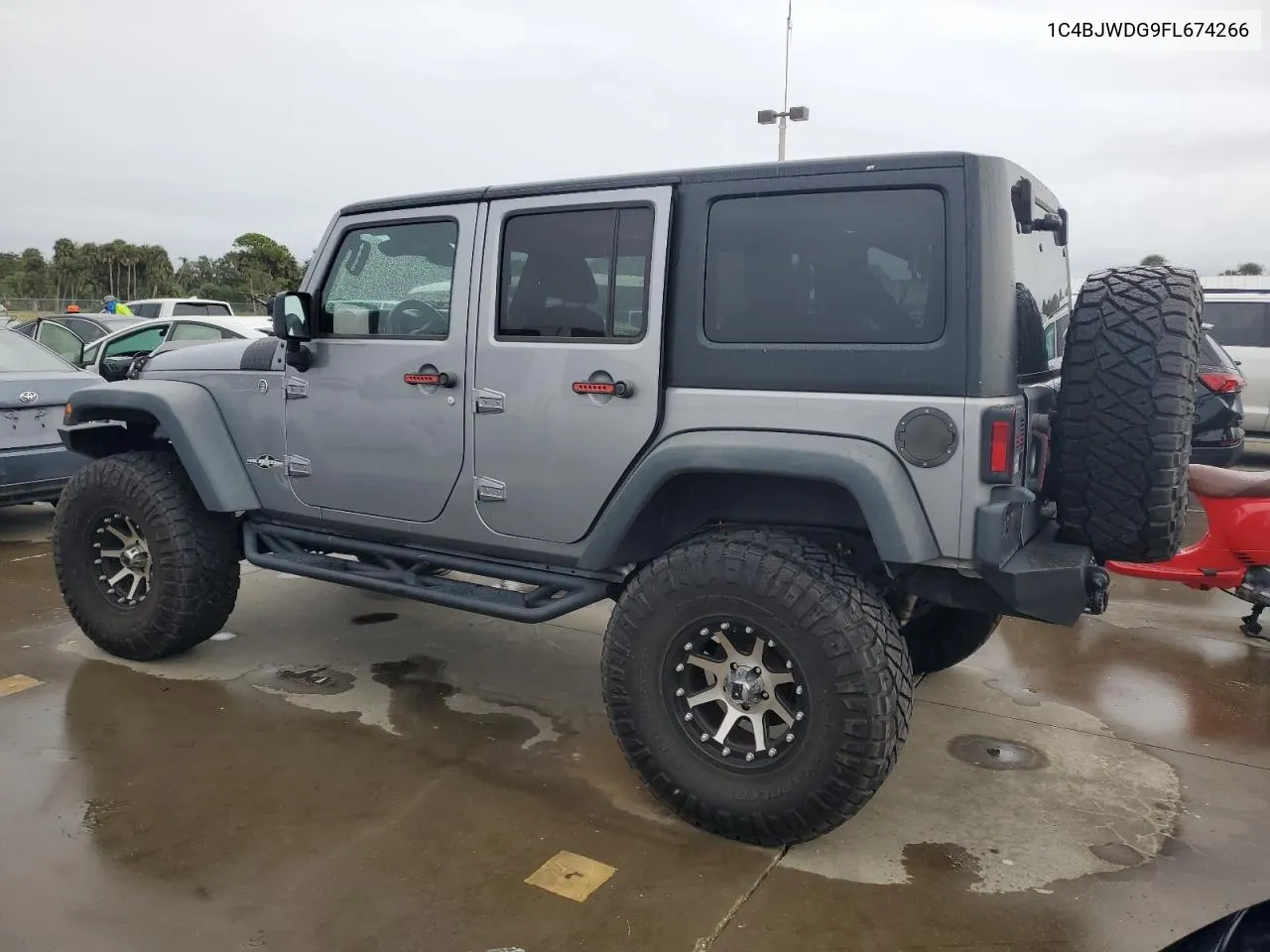 2015 Jeep Wrangler Unlimited Sport VIN: 1C4BJWDG9FL674266 Lot: 74394764