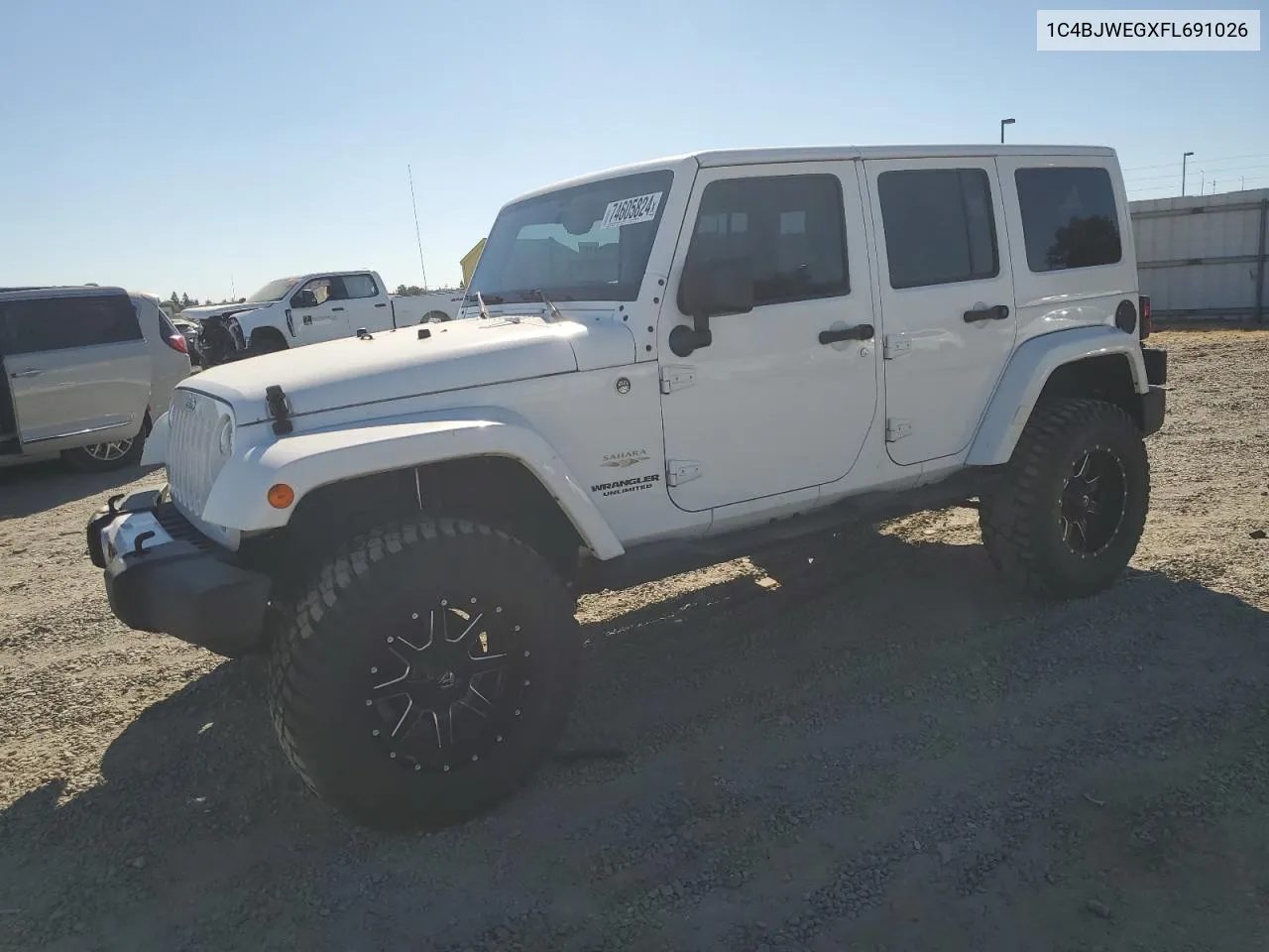 2015 Jeep Wrangler Unlimited Sahara VIN: 1C4BJWEGXFL691026 Lot: 74605824