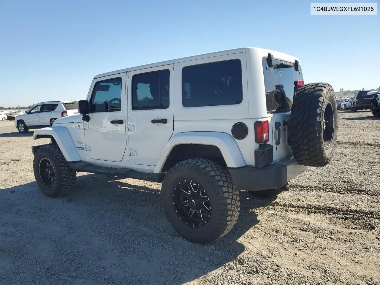 2015 Jeep Wrangler Unlimited Sahara VIN: 1C4BJWEGXFL691026 Lot: 74605824