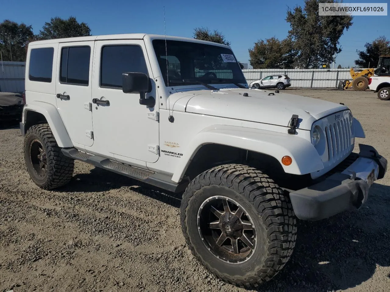 2015 Jeep Wrangler Unlimited Sahara VIN: 1C4BJWEGXFL691026 Lot: 74605824