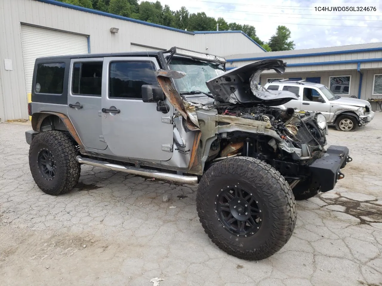 1C4HJWDG5GL324676 2016 Jeep Wrangler Unlimited Sport