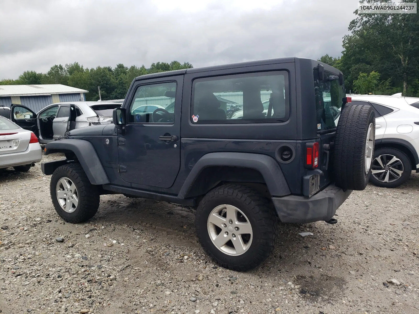 2016 Jeep Wrangler Sport VIN: 1C4AJWAG9GL244237 Lot: 64243044