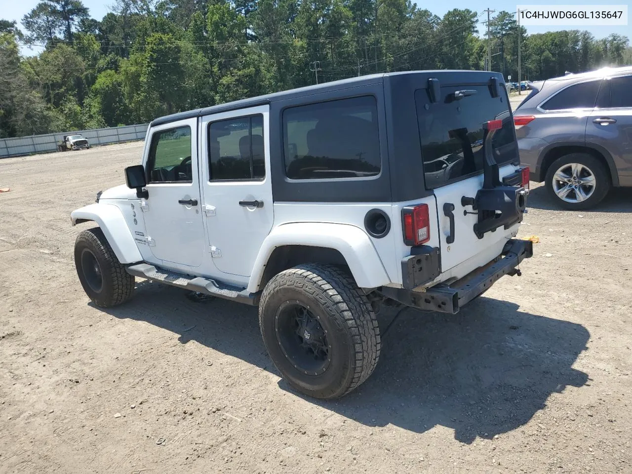 1C4HJWDG6GL135647 2016 Jeep Wrangler Unlimited Sport