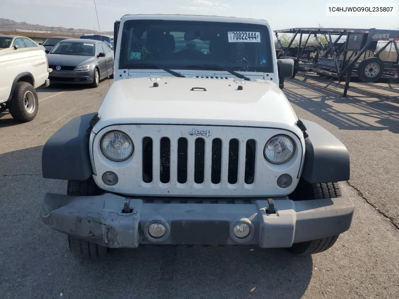 1C4HJWDG9GL235807 2016 Jeep Wrangler Unlimited Sport