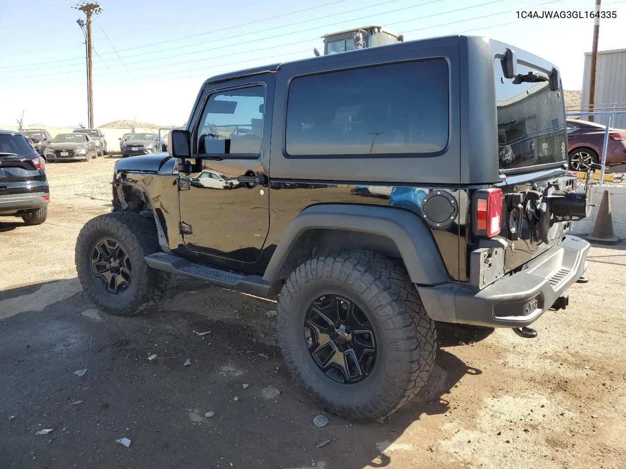 2016 Jeep Wrangler Sport VIN: 1C4AJWAG3GL164335 Lot: 74830464