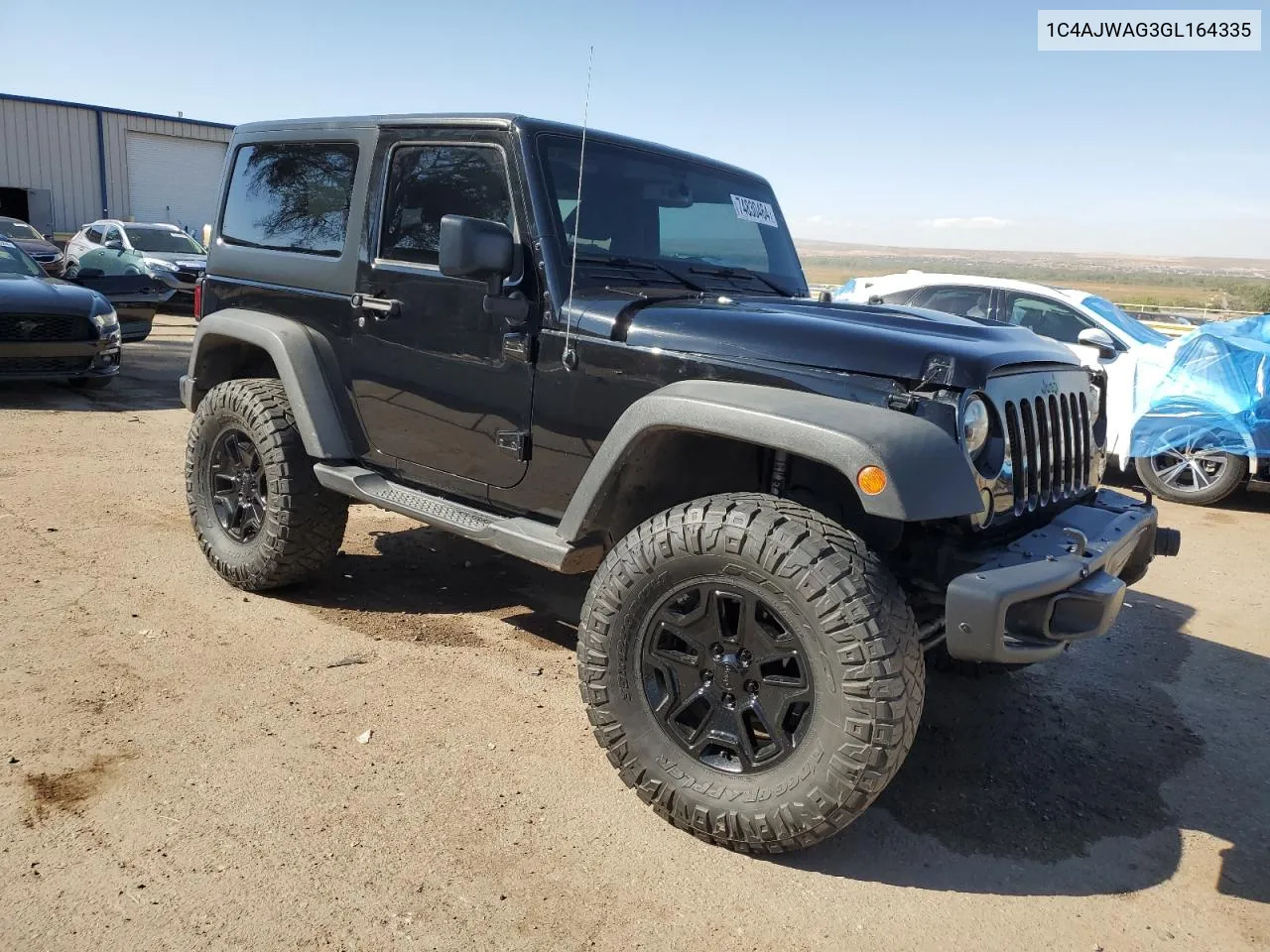 2016 Jeep Wrangler Sport VIN: 1C4AJWAG3GL164335 Lot: 74830464