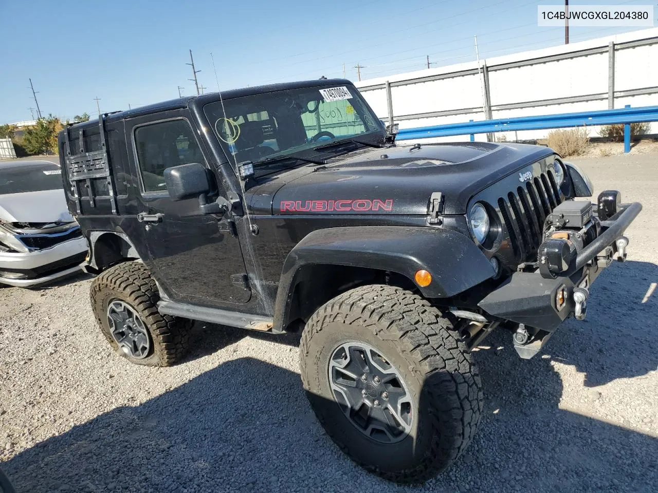 2016 Jeep Wrangler Rubicon VIN: 1C4BJWCGXGL204380 Lot: 74970094