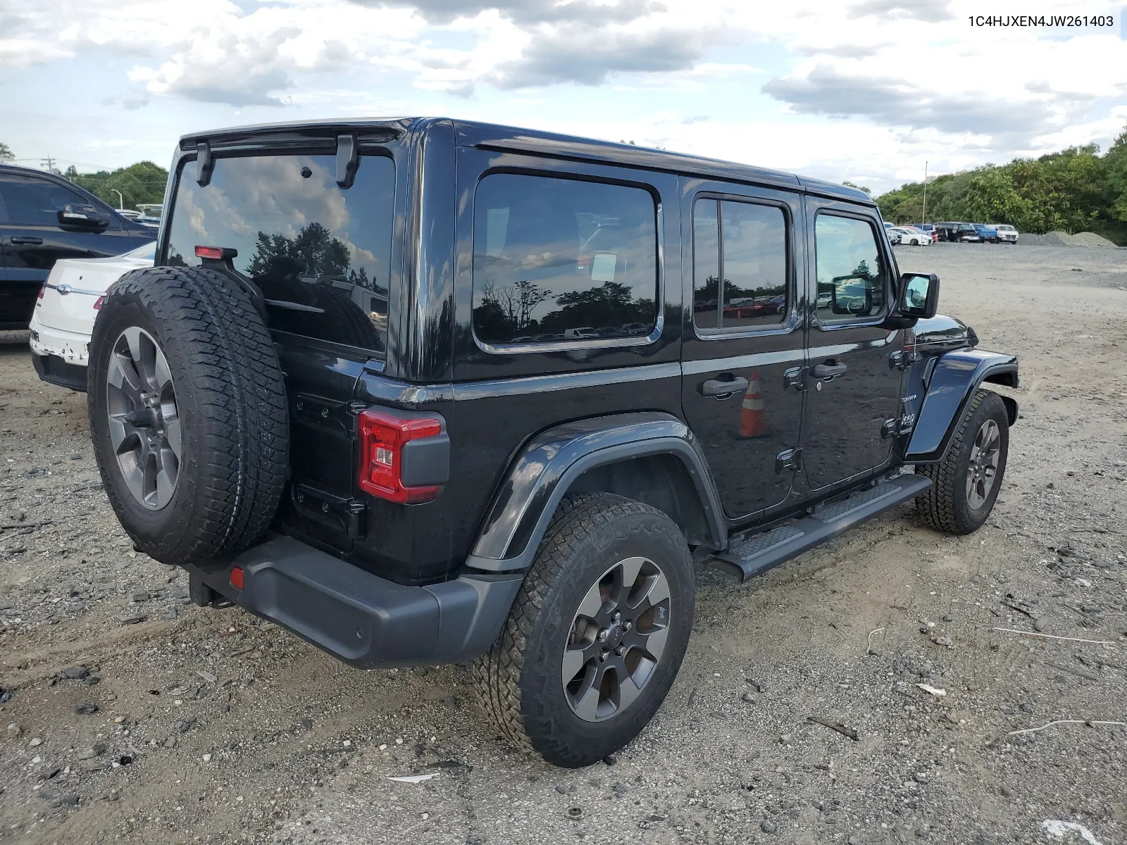 2018 Jeep Wrangler Unlimited Sahara VIN: 1C4HJXEN4JW261403 Lot: 66327984