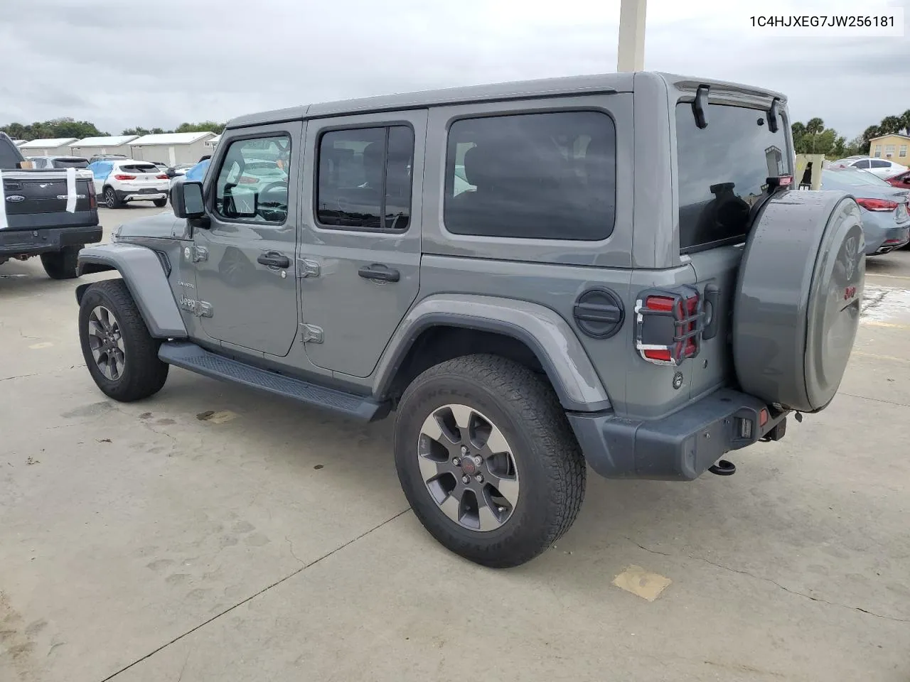 2018 Jeep Wrangler Unlimited Sahara VIN: 1C4HJXEG7JW256181 Lot: 74901974