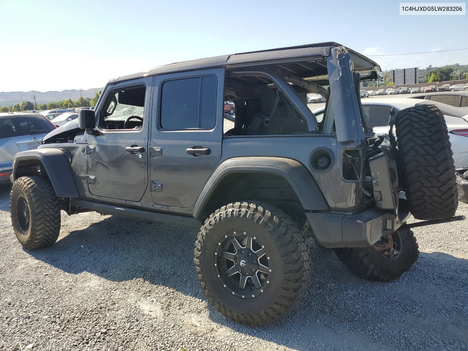 2020 Jeep Wrangler Unlimited Sport VIN: 1C4HJXDG5LW283206 Lot: 66106794