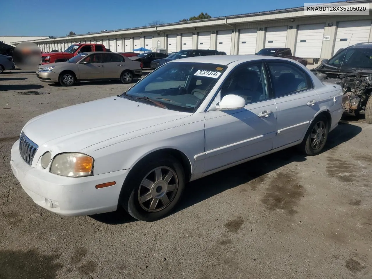 2003 Kia Optima Lx VIN: KNAGD128X35205020 Lot: 76521374