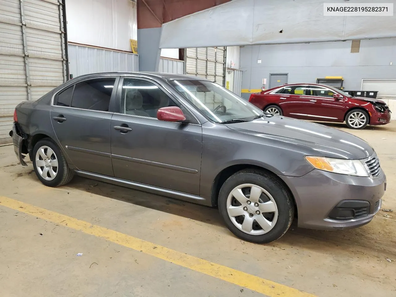 2009 Kia Optima Lx VIN: KNAGE228195282371 Lot: 70035024