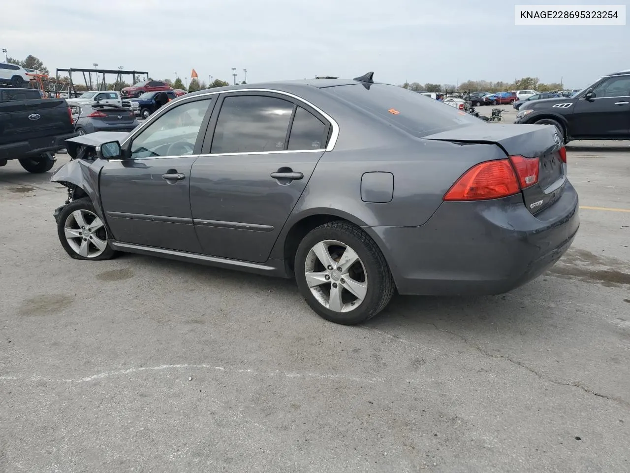 2009 Kia Optima Lx VIN: KNAGE228695323254 Lot: 77758914