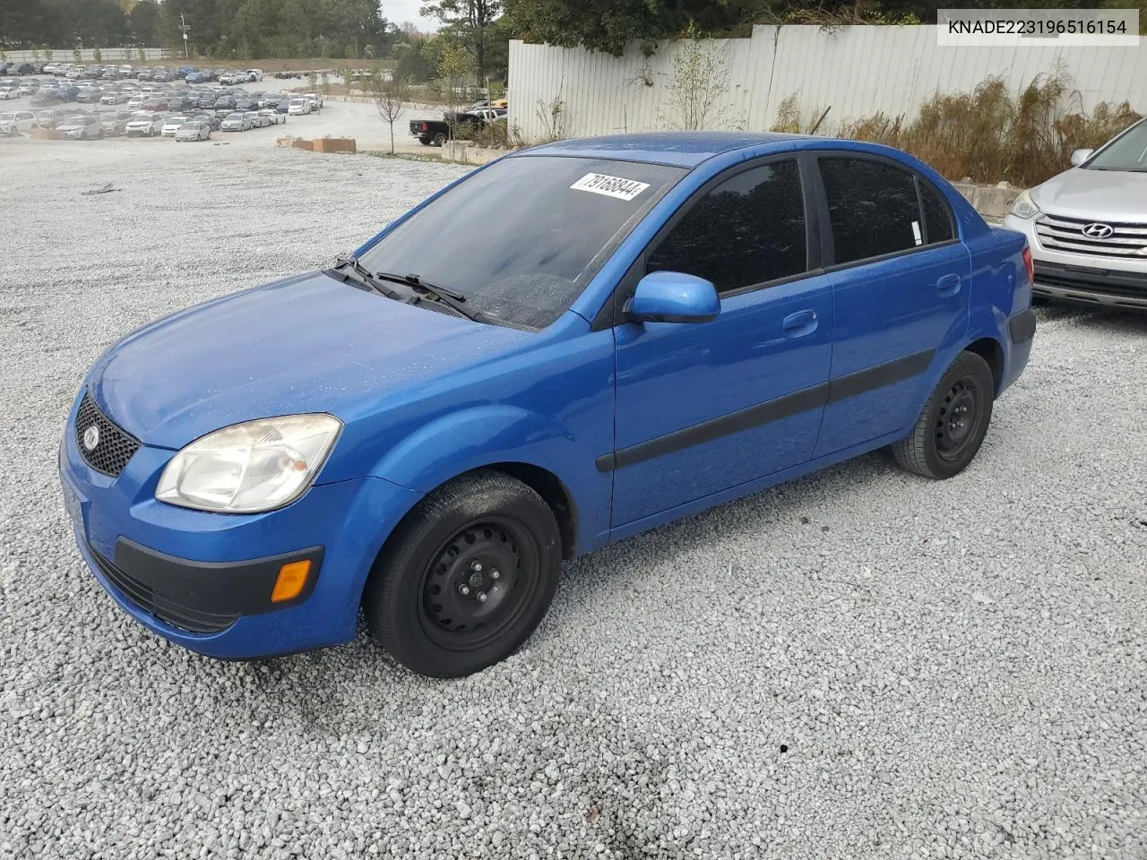 2009 Kia Rio Base VIN: KNADE223196516154 Lot: 79168844