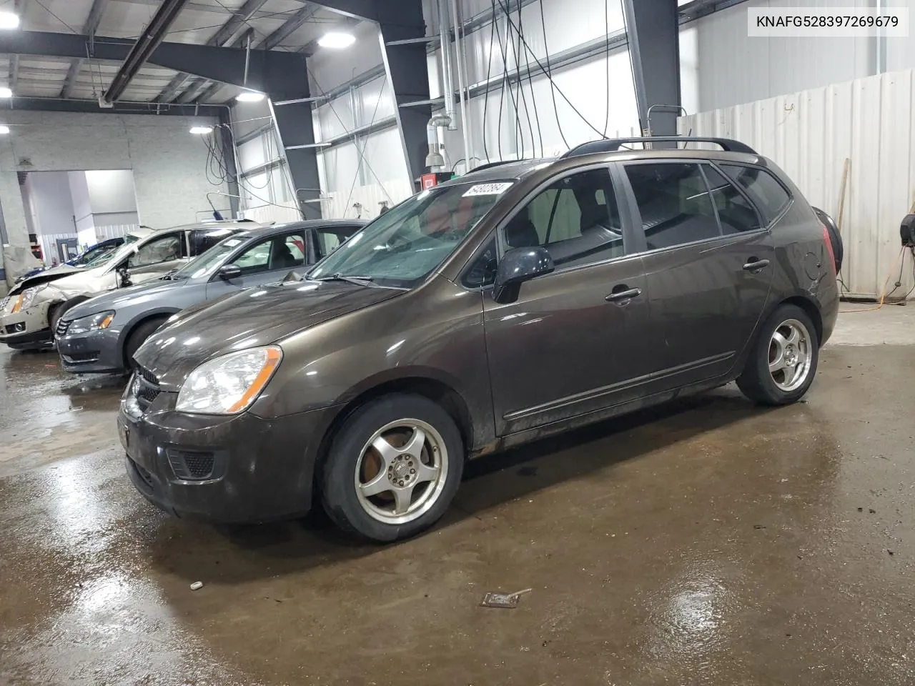 2009 Kia Rondo Base VIN: KNAFG528397269679 Lot: 64802864