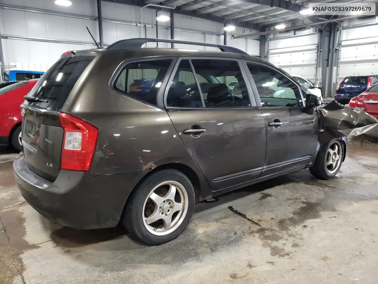 2009 Kia Rondo Base VIN: KNAFG528397269679 Lot: 64802864