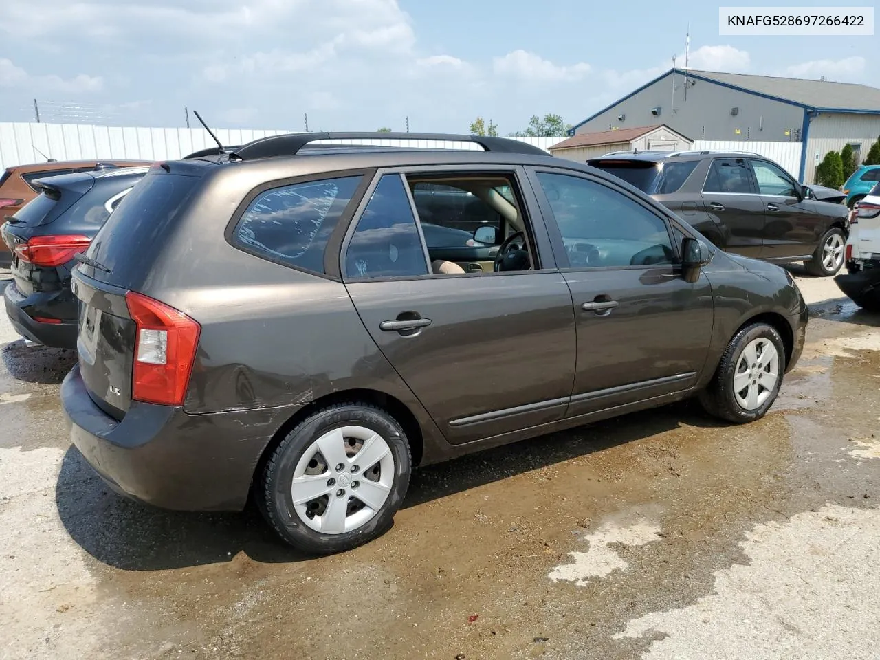 2009 Kia Rondo Base VIN: KNAFG528697266422 Lot: 65730474