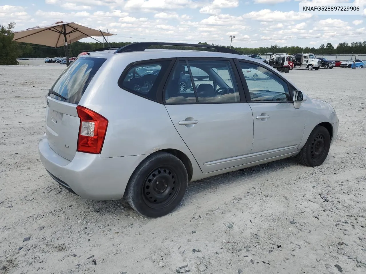 2009 Kia Rondo Base VIN: KNAFG528897229906 Lot: 70821774