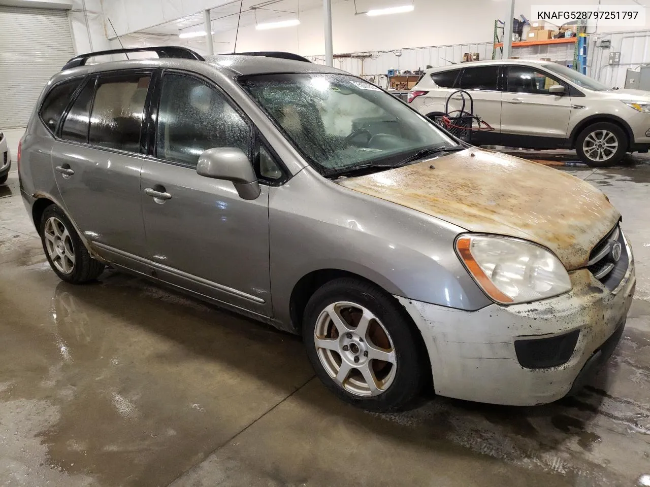 2009 Kia Rondo Base VIN: KNAFG528797251797 Lot: 75007014