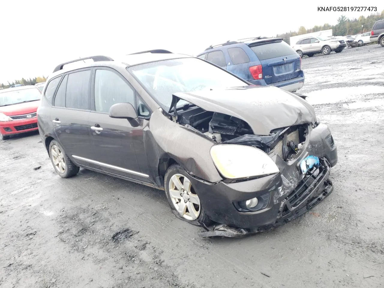 2009 Kia Rondo Base VIN: KNAFG528197277473 Lot: 75325864