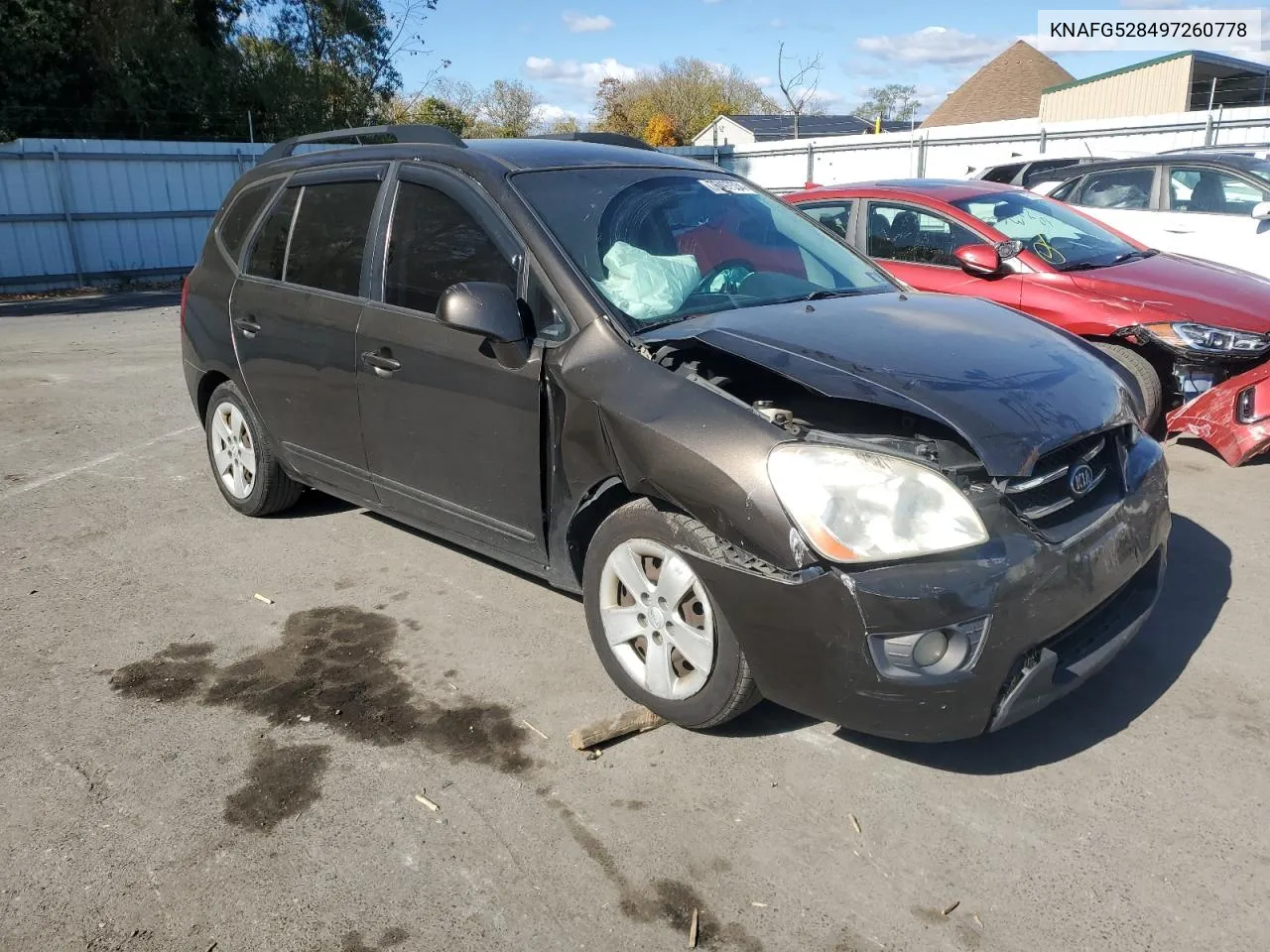 2009 Kia Rondo Base VIN: KNAFG528497260778 Lot: 76497534