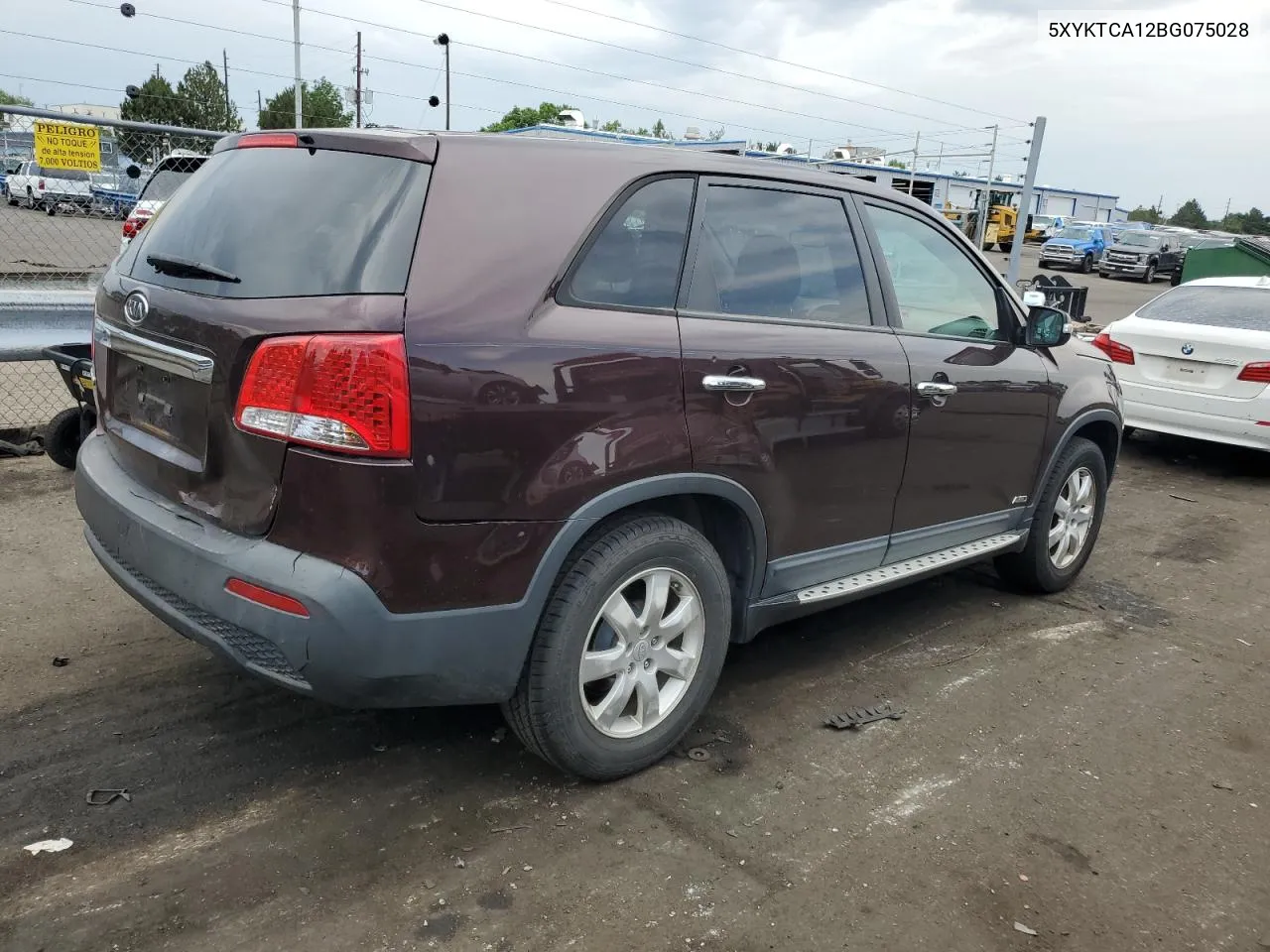 2011 Kia Sorento Base VIN: 5XYKTCA12BG075028 Lot: 62936004