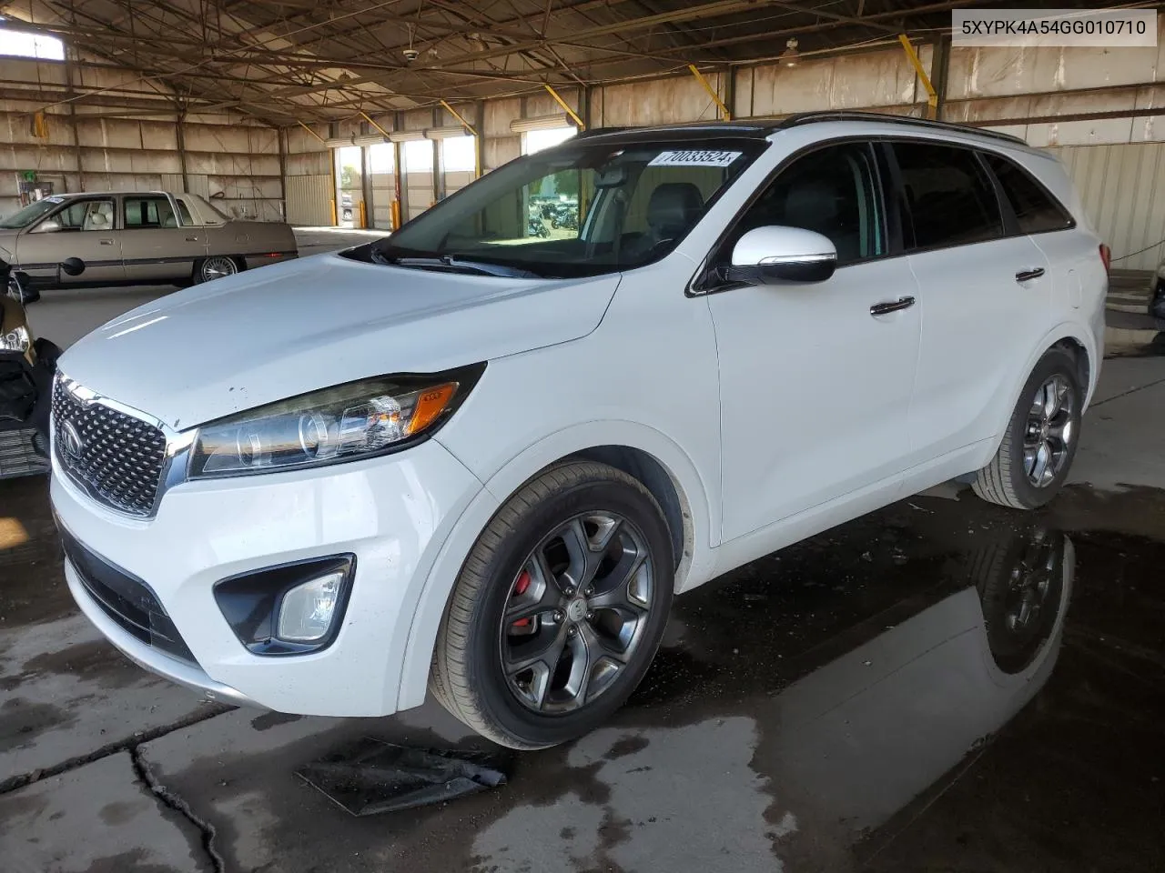 2016 Kia Sorento Sx VIN: 5XYPK4A54GG010710 Lot: 70033524