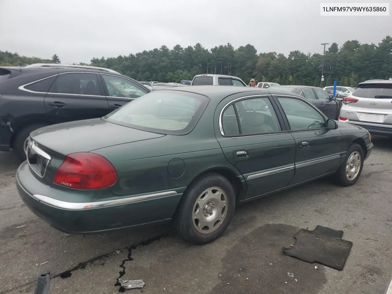 1998 Lincoln Continental VIN: 1LNFM97V9WY635860 Lot: 72859264