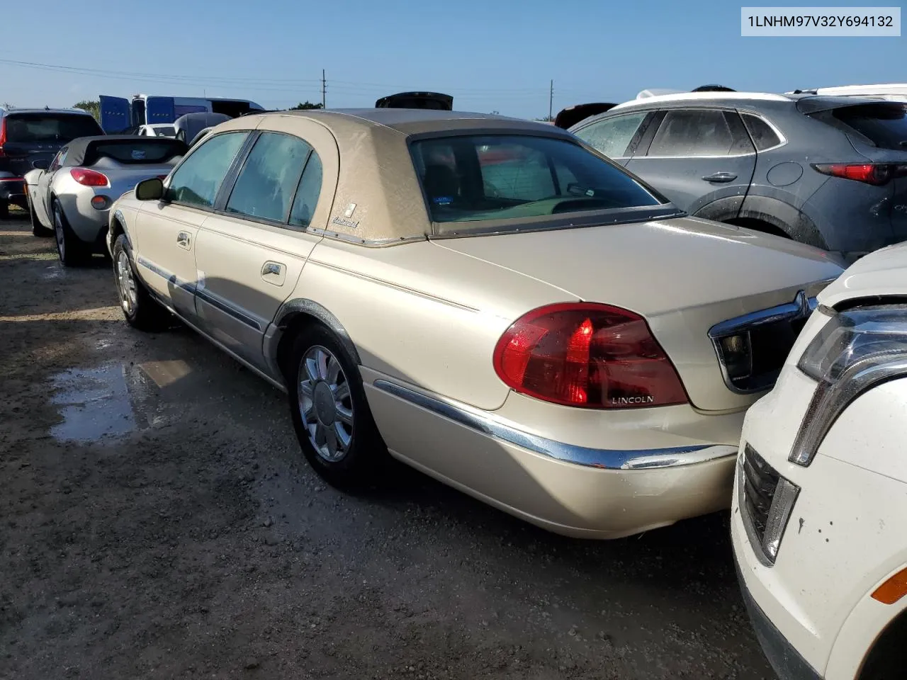 2002 Lincoln Continental VIN: 1LNHM97V32Y694132 Lot: 76410144