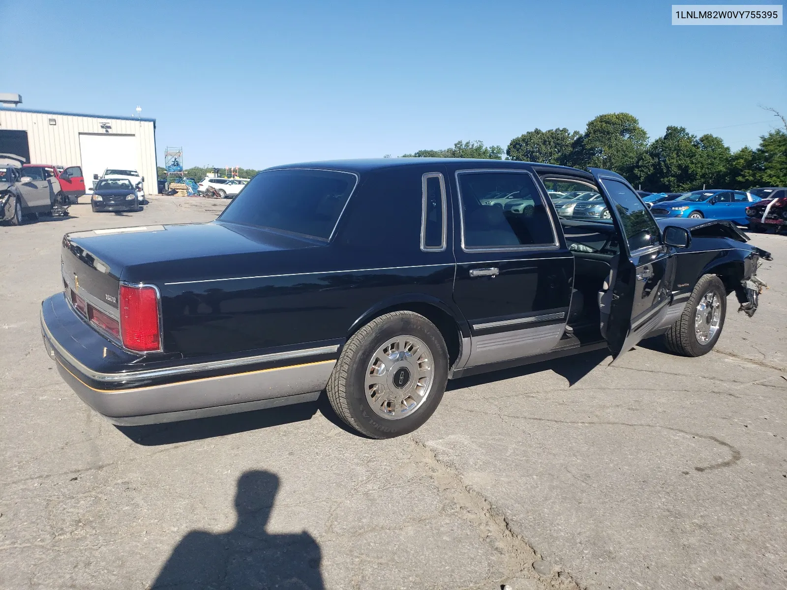 1997 Lincoln Town Car Signature VIN: 1LNLM82W0VY755395 Lot: 60832324