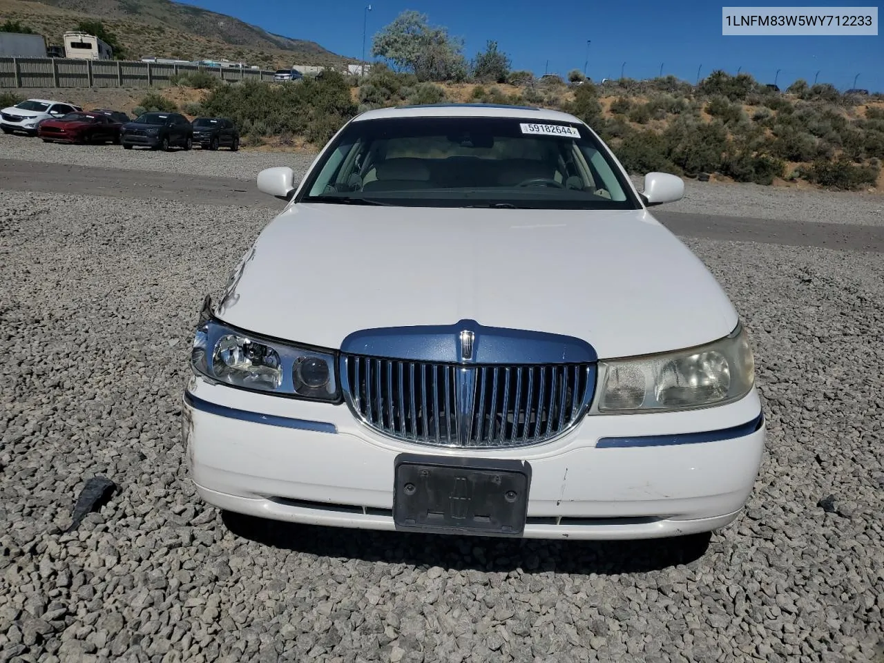 1998 Lincoln Town Car Cartier VIN: 1LNFM83W5WY712233 Lot: 59182644