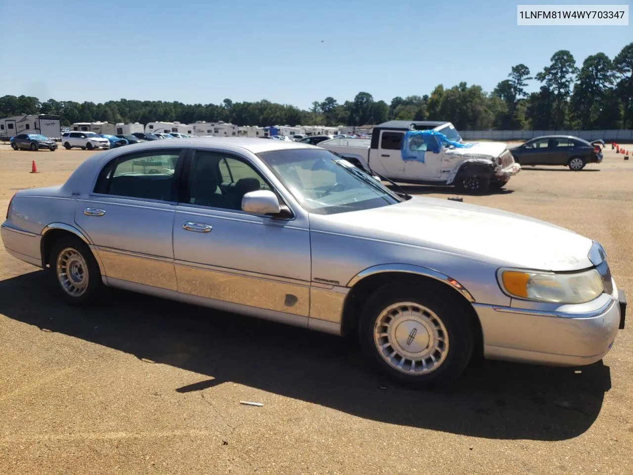 1998 Lincoln Town Car Executive VIN: 1LNFM81W4WY703347 Lot: 70716514