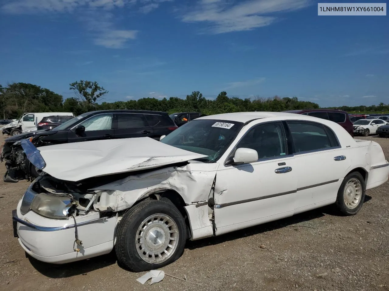 1999 Lincoln Town Car Executive VIN: 1LNHM81W1XY661004 Lot: 66190164