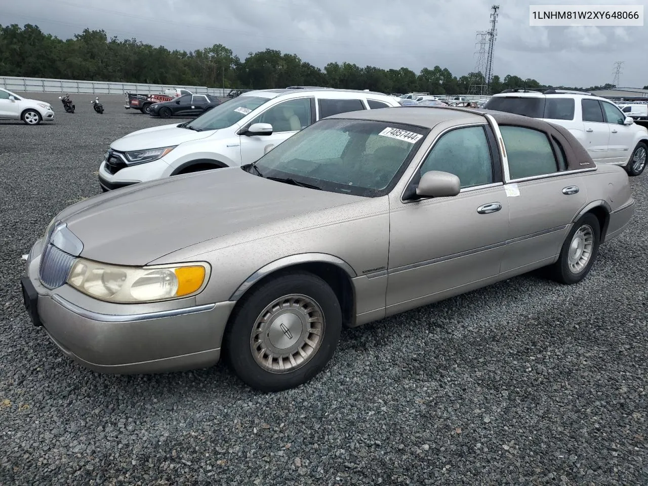 1999 Lincoln Town Car Executive VIN: 1LNHM81W2XY648066 Lot: 74857444