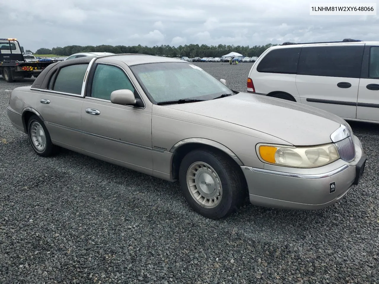 1999 Lincoln Town Car Executive VIN: 1LNHM81W2XY648066 Lot: 74857444