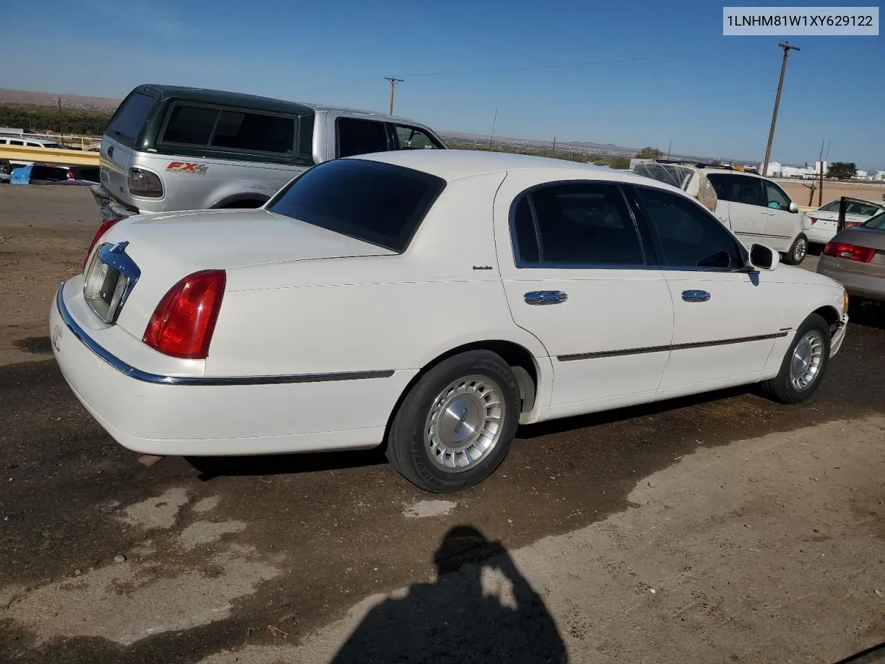 1999 Lincoln Town Car Executive VIN: 1LNHM81W1XY629122 Lot: 77230334